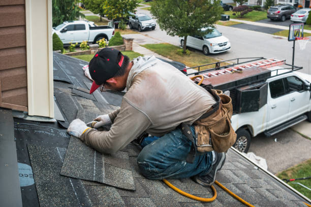 Professional Gutter Repair And Installation technician working in Battle Ground, IN